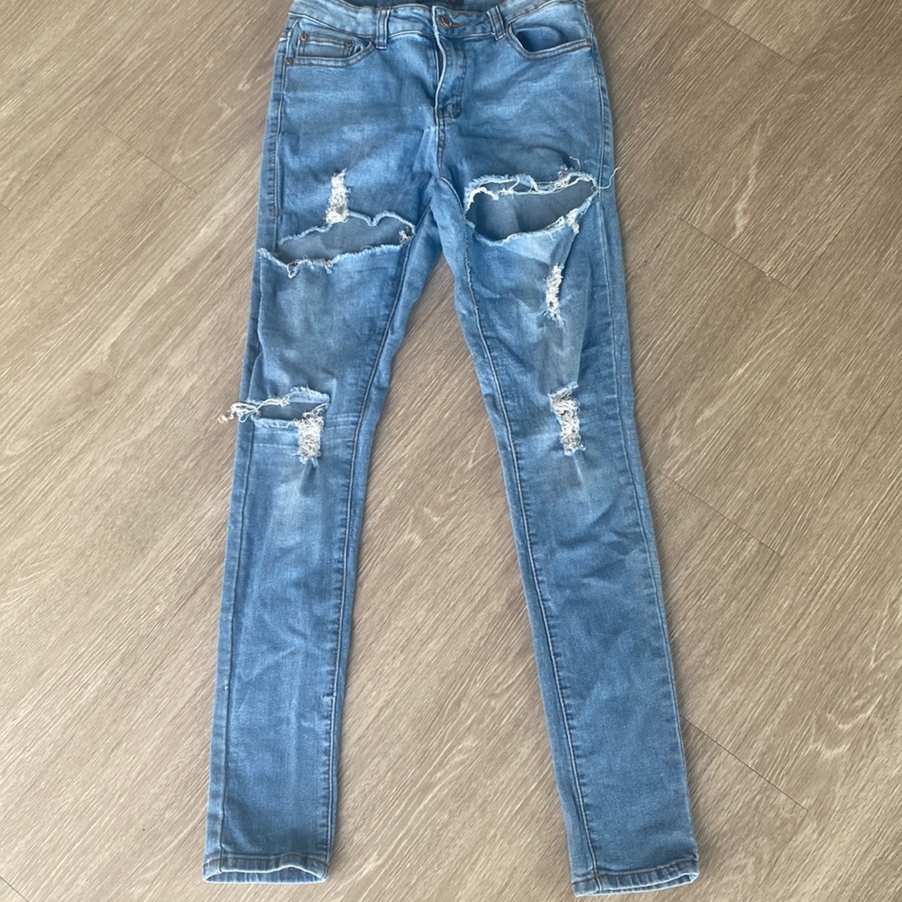 Distressed denim pants